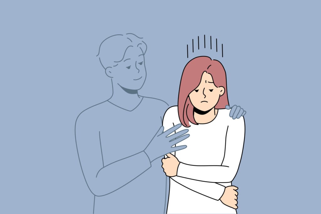 无形的男人拥抱失落孤独的女人，渴望爱情或关系。悲伤的女孩与男性恋人的轮廓