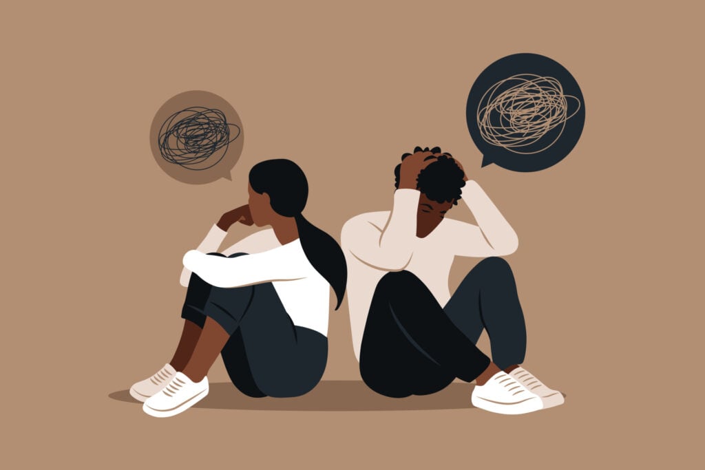 如何在关系中停止不安全感 1 一对背对背坐着,彼此远离的情侣。带有杂乱线条的思想泡泡。